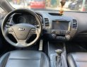 Kia K3   2015 - Cần bán xe Kia K3 1.6AT đời 2015, màu vàng cát, giá tốt