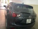 Mazda CX 5   2014 - Cần bán lại xe Mazda CX 5 năm sản xuất 2014, màu đen, 580 triệu