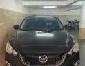 Mazda CX 5   2014 - Cần bán lại xe Mazda CX 5 năm sản xuất 2014, màu đen, 580 triệu