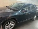 Mazda CX 5   2014 - Cần bán lại xe Mazda CX 5 năm sản xuất 2014, màu đen, 580 triệu