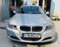 BMW 3 Series   2010 - Bán ô tô BMW 320i đời 2010, màu bạc, nhập khẩu