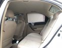 Chevrolet Aveo 2014 - Cần bán lại xe Chevrolet Aveo đời 2014, màu bạc chính chủ, 285tr