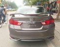 Honda City 2016 - Cần bán xe Honda City 1.5AT sản xuất năm 2016, màu nâu