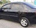 Toyota Vios 2009 - Cần bán xe Toyota Vios năm 2009, màu đen xe gia đình