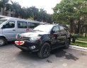 Toyota Fortuner 2016 - Cần bán xe Toyota Fortuner AT sản xuất 2016, màu đen số tự động