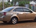 Daewoo Lacetti 2005 - Cần bán Daewoo Lacetti năm sản xuất 2005, màu vàng, xe nhập, 150tr