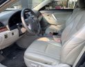 Toyota Camry 2010 - Bán xe Toyota Camry 2.4G sản xuất 2010, màu đen, số tự động