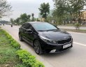 Kia Cerato 2018 - Cần bán Kia Cerato 1.6 AT sản xuất 2018, màu đen