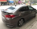 Honda City 2016 - Cần bán xe Honda City 1.5AT sản xuất năm 2016, màu nâu