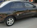 Toyota Vios 2009 - Cần bán xe Toyota Vios năm 2009, màu đen xe gia đình