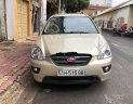 Kia Carens 2010 - Bán xe Kia Carens AT đời 2010, màu vàng chính chủ, 300tr