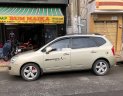 Kia Carens 2010 - Bán xe Kia Carens AT đời 2010, màu vàng chính chủ, 300tr