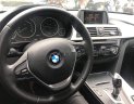 BMW 3 Series   2015 - Bán ô tô BMW 320i sản xuất 2015, màu đen, form 2016