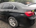 BMW 3 Series   2015 - Bán ô tô BMW 320i sản xuất 2015, màu đen, form 2016