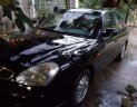 Daewoo Nubira  1.6MT  2002 - Bán Daewoo Nubira 1.6MT năm sản xuất 2002, màu đen, nhập khẩu nguyên chiếc, giá chỉ 60 triệu