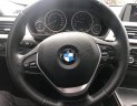 BMW 3 Series   2015 - Bán ô tô BMW 320i sản xuất 2015, màu đen, form 2016