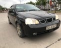 Daewoo Lacetti   2004 - Cần bán gấp Daewoo Lacetti đời 2004, màu đen