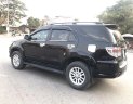 Toyota Fortuner 2014 - Bán ô tô Toyota Fortuner 2.5GMT năm sản xuất 2014, màu đen xe gia đình, giá tốt