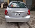 Daewoo Lacetti 2004 - Bán ô tô Daewoo Lacetti MT sản xuất 2004, màu bạc, xe nhập số sàn