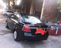 Daewoo Gentra 2009 - Cần bán xe Daewoo Gentra đời 2009, màu đen giá cạnh tranh