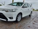 Toyota Vios 2014 - Gia đình cần bán Toyota Vios sản xuất 2014, màu trắng, mới đi được 10.000km