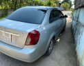 Daewoo Lacetti 2005 - Cần bán lại xe Daewoo Lacetti sản xuất năm 2005, màu bạc