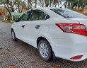 Toyota Vios 2014 - Gia đình cần bán Toyota Vios sản xuất 2014, màu trắng, mới đi được 10.000km