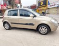 Hyundai Getz 2009 - Cần bán lại xe Hyundai Getz sản xuất 2009, màu vàng, xe nhập