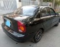 Daewoo Lanos   2004 - Bán Daewoo Lanos năm sản xuất 2004, màu đen