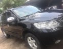 Hyundai Santa Fe 2008 - Gia đình cần bán nhanh chiếc Hyundai Santa Fe sản xuất 2008, màu đen, xe nhập, giá thấp