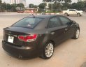 Kia Cerato   2011 - Cần bán xe Kia Cerato AT năm sản xuất 2011, màu đen, xe nhập số tự động