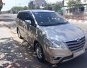 Toyota Innova 2014 - Cần bán xe Toyota Innova đời 2014, màu vàng