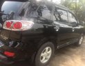 Hyundai Santa Fe 2008 - Gia đình cần bán Hyundai Santa Fe đời 2008, màu đen, xe ít sử dụng