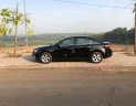 Chevrolet Cruze   2010 - Cần bán lại xe Chevrolet Cruze 2010, màu đen, xe nhập  