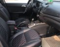 Kia Cerato   2011 - Cần bán xe Kia Cerato AT năm sản xuất 2011, màu đen, xe nhập số tự động