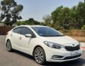 Kia K3 2015 - Bán nhanh chiếc Kia K3 2015, màu trắng giá cạnh tranh, giao nhanh tận nhà