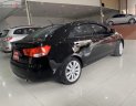 Kia Forte EX 1.6MT 2011 - Cần bán Kia Forte EX 1.6MT năm sản xuất 2011, màu đen xe gia đình, giá 355tr