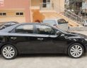 Kia Cerato 2011 - Cần bán lại xe Kia Cerato 1.6 AT đời 2011, màu đen, xe nhập