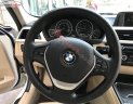 BMW 3 Series 2015 - Cần bán gấp BMW 3 Series 320i 2.0L Twin-turbo đời 2015, màu trắng, xe nhập số tự động