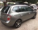 Kia Carens   2010 - Bán xe cũ Kia Carens SX 2.0 AT đời 2010, màu nâu