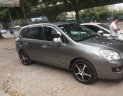 Kia Carens   2010 - Bán xe cũ Kia Carens SX 2.0 AT đời 2010, màu nâu