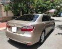 Toyota Camry   2014 - Bán ô tô Toyota Camry 2.5Q năm 2014, màu vàng, giá 792tr