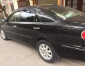 Toyota Camry   2003 - Bán Toyota Camry 3.0V sản xuất 2003, màu đen, xe gia đình