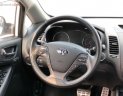 Kia K3 2014 - Cần bán gấp Kia K3 2.0 AT sản xuất năm 2014, màu trắng