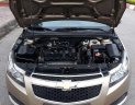 Chevrolet Cruze 2011 - Cần bán lại xe Chevrolet Cruze sản xuất năm 2011, màu vàng cát