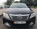 Toyota Camry 2014 - Cần bán gấp Toyota Camry 2.0E năm 2014, màu đen, 670tr