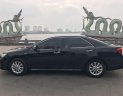 Toyota Camry 2014 - Cần bán gấp Toyota Camry 2.0E năm 2014, màu đen, 670tr