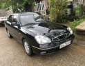 Daewoo Nubira   2003 - Bán Daewoo Nubira đời 2003, màu đen, số tự động, 75 triệu