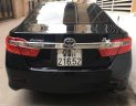 Toyota Camry 2014 - Cần bán gấp Toyota Camry 2.0E năm 2014, màu đen, 670tr