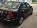 Ford Laser 2003 - Cần bán xe Ford Laser 1.8AT đời 2003, màu đen số tự động, giá 168tr